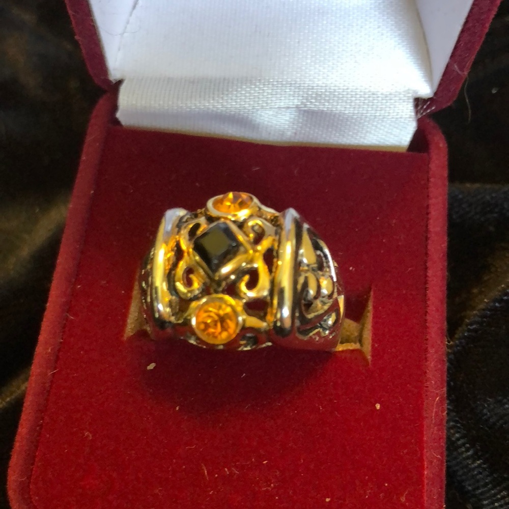 Silver tone and crystal ring